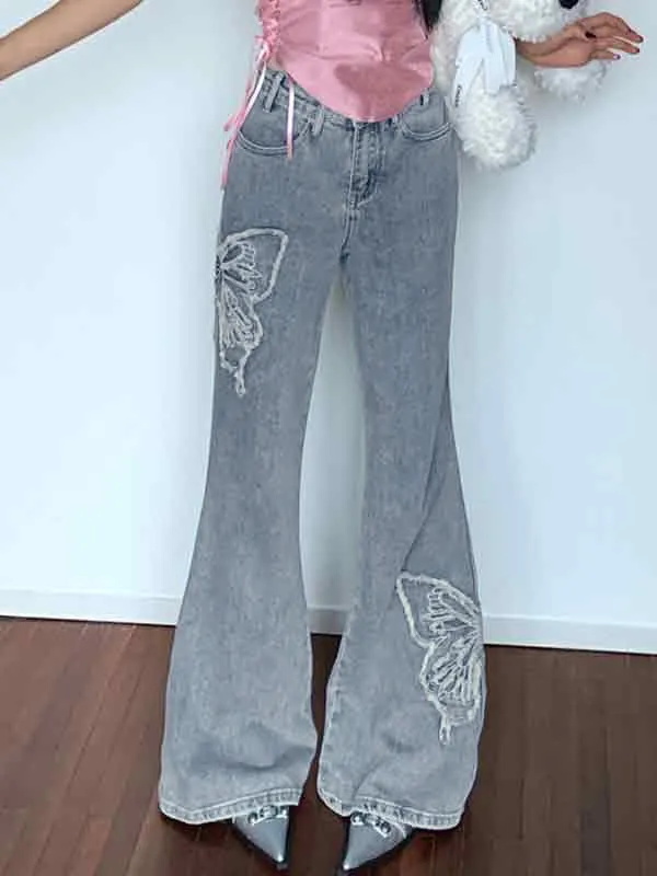 Flared trousers with butterfly embroidery