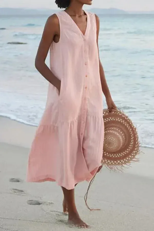 Linn - Sleeveless long dress with V-neckline and buttons.