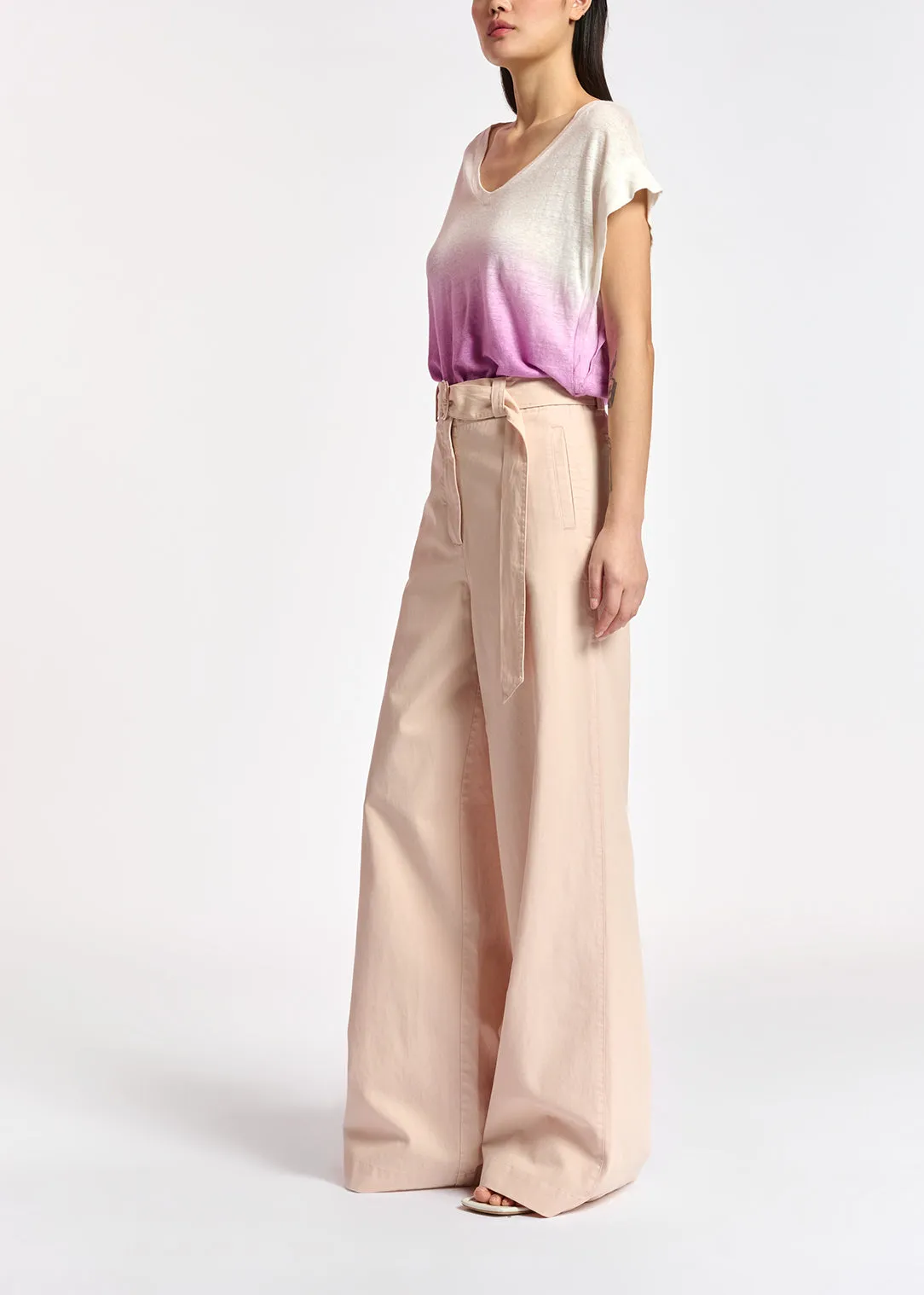Powder pink belted high-waisted wide-leg jeans