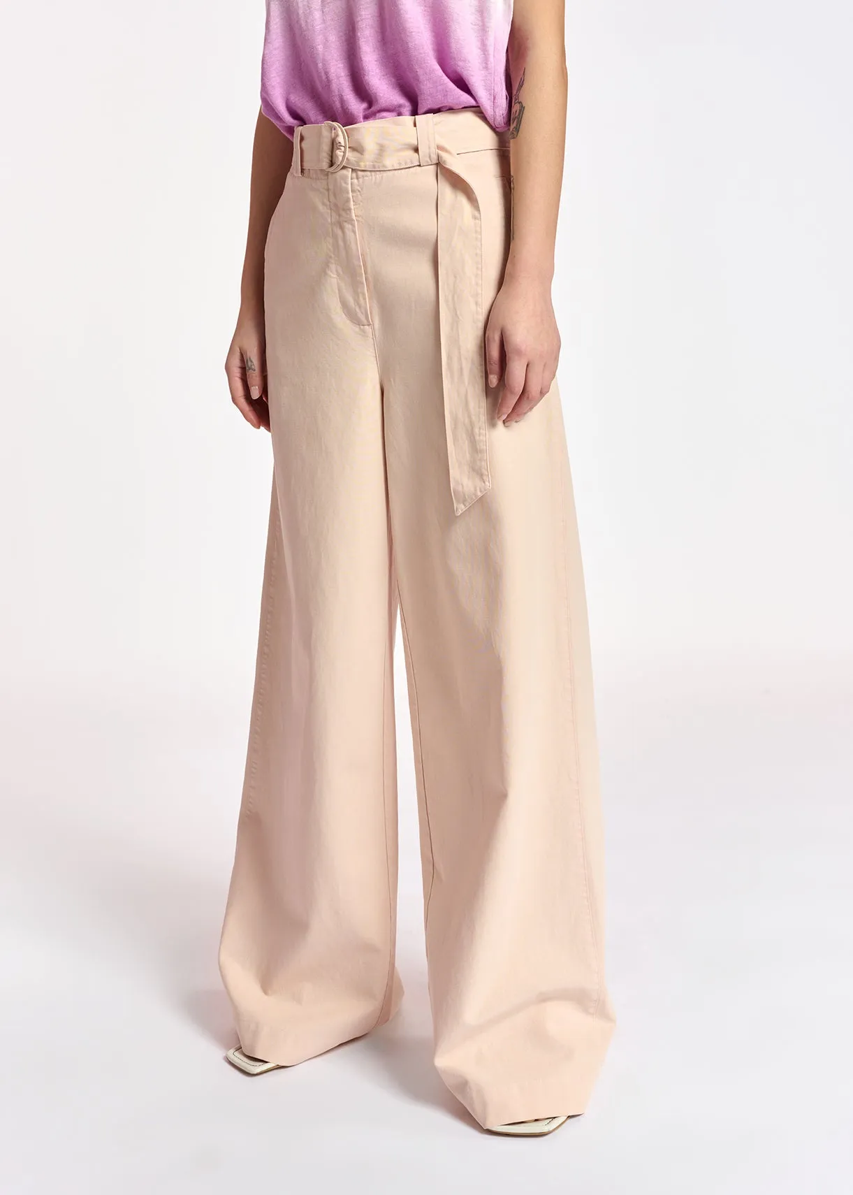 Powder pink belted high-waisted wide-leg jeans