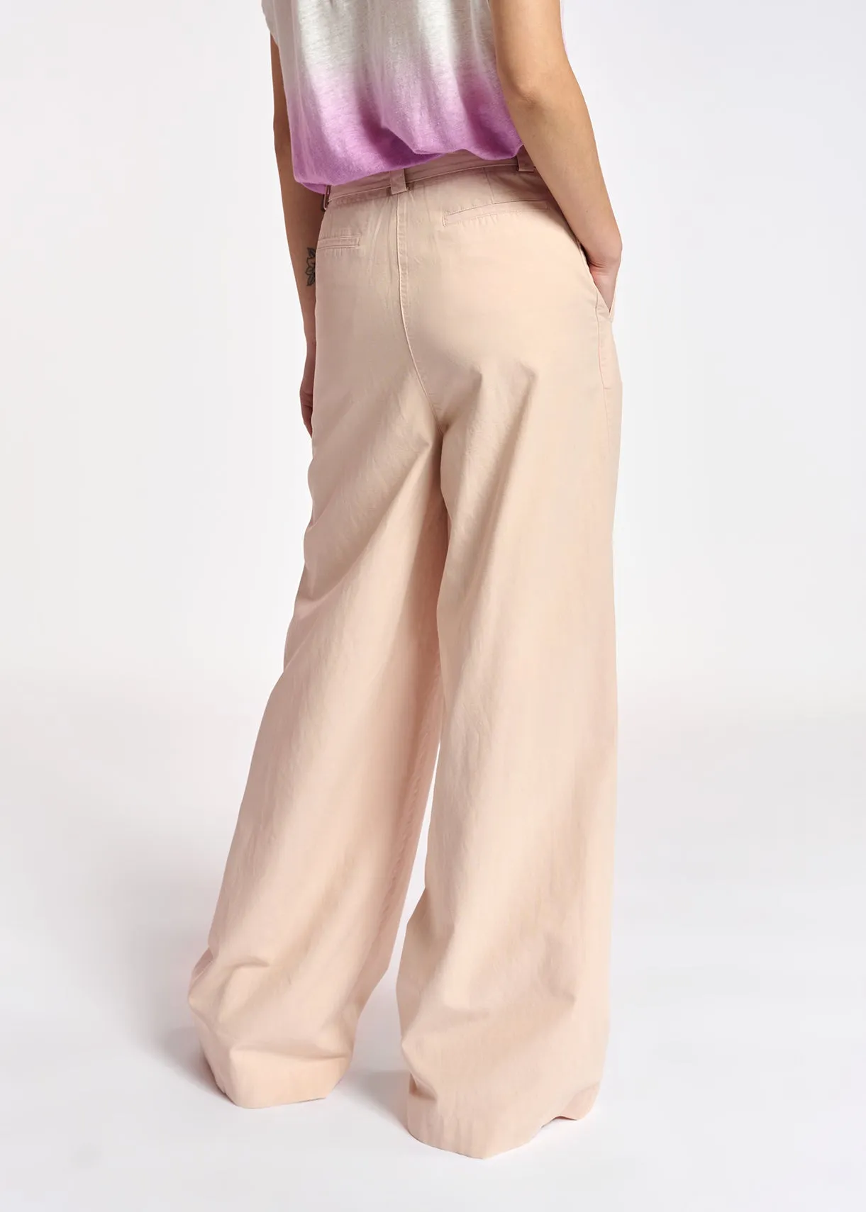 Powder pink belted high-waisted wide-leg jeans