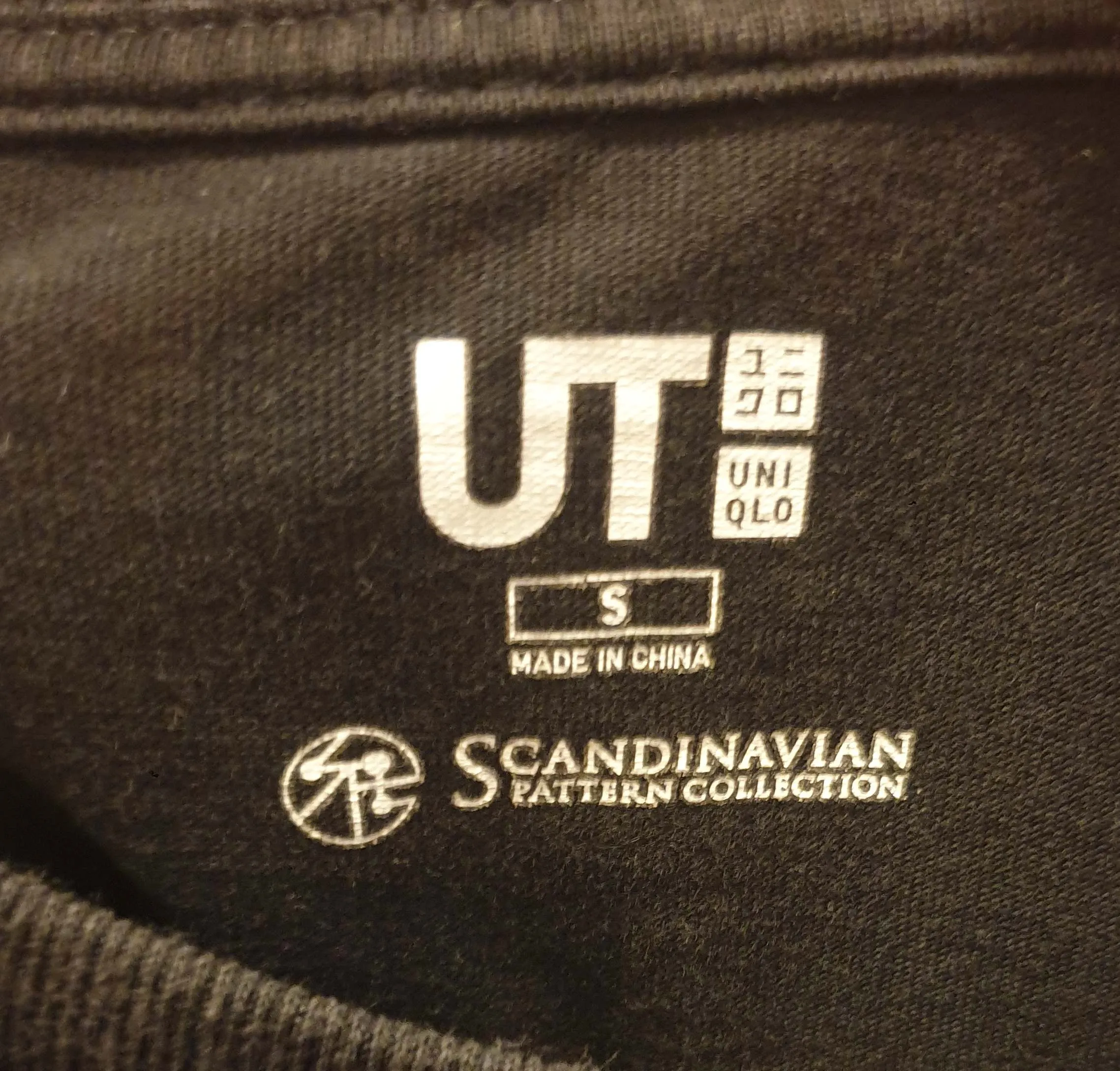 Uniqlo x Scandanavian Pattern Collection black top with cute pocket size S